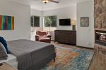Private TV, gas fireplace, and sunny seating